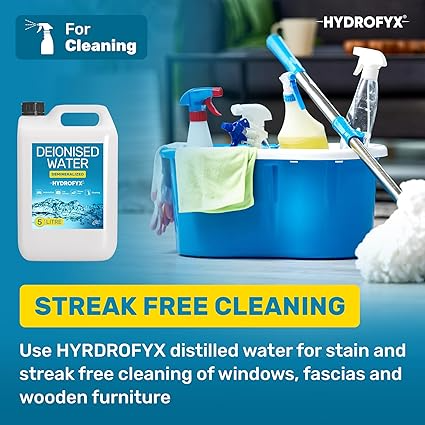 Cleaning supplies and mop bucket showing how HYDROFYX deionised water enables streak-free cleaning of windows, fascias and wooden furniture.