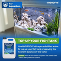 Aquarium with fish and plants, highlighting the use of HYDROFYX distilled water to top up fish tanks without altering nutrient balance.